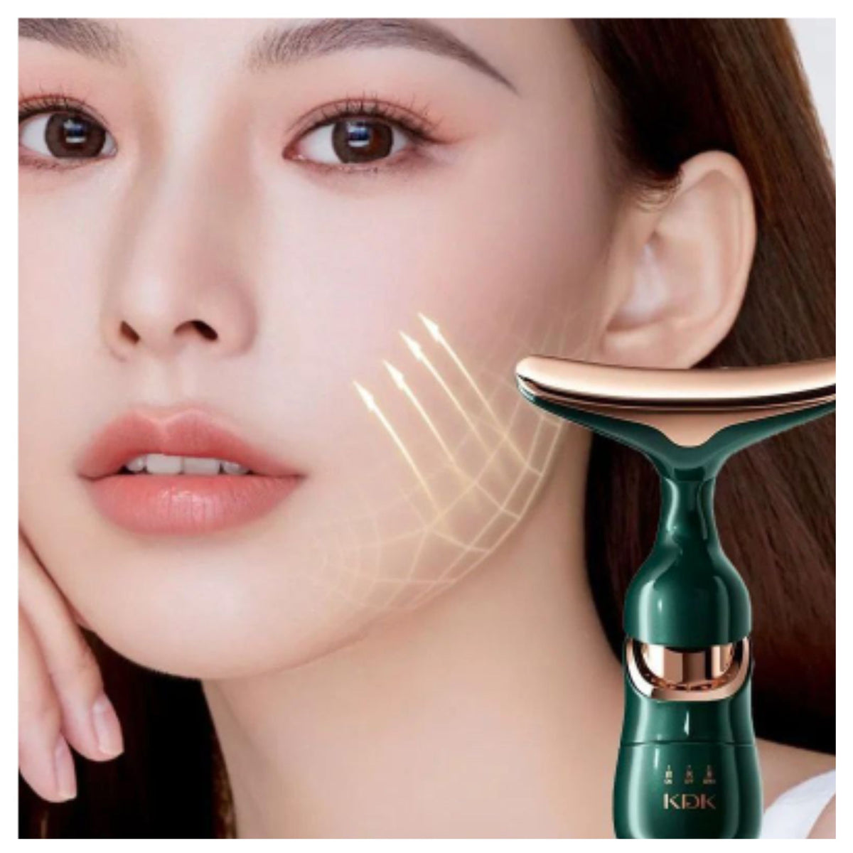 Close-up of woman using green and rose gold 3 in 1 anti wrinkle face neck eye massager device on cheek with glowing grid graphic for skin treatment - KIK brand