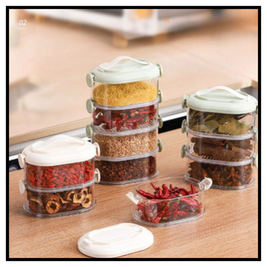🫙 FreshLock 5-Layer Sealed Spice Tower – Clear Stackable Masala Storage Containers with Light Green Lids Filled with Red Chillies and Spices on Wooden Kitchen Counter