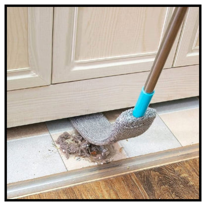 🧹 Microfiber Gap Dust Brush Cleaner – Close-up of Flexible Retractable Long Handle Duster with Gray Microfiber Head and Blue Connector Cleaning Dust Under Light Wood Cabinet on Tile Floor