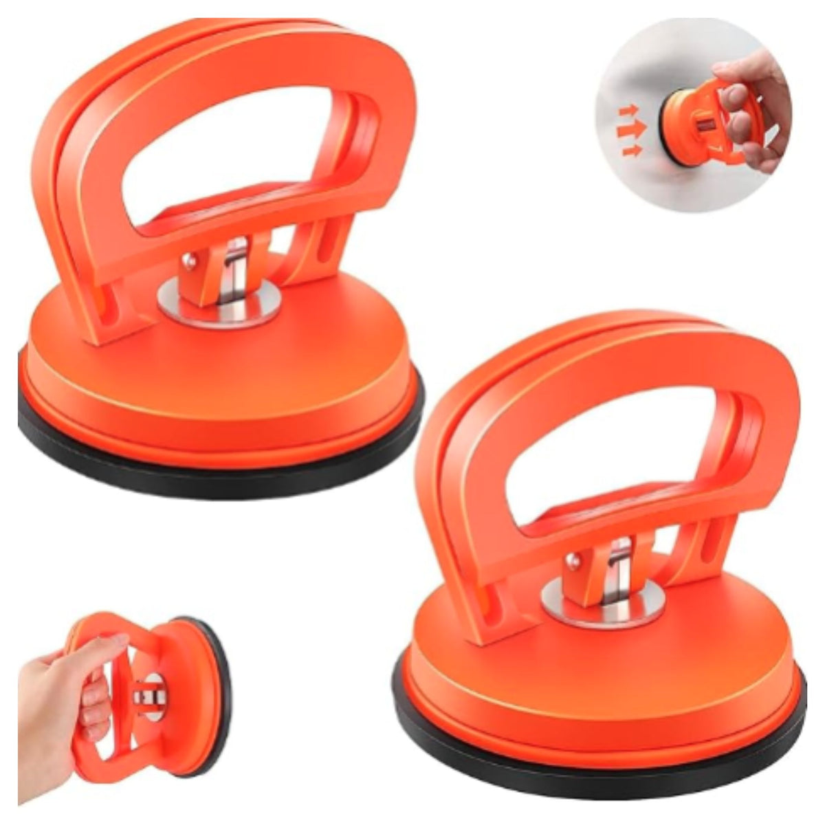 Two bright orange suction cup dent puller tools with black pads for car dent removal on white background