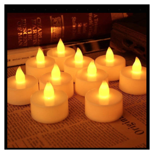 🪔 LED Diya Light – Pack of 6 Warm Yellow Flameless LED Tea Light Candles with Flickering Flame Glow on Newspaper Background