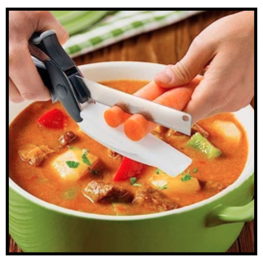 ✂️ Multi Function Kitchen Vegetable Food Chopper Scissors – Close-up of Hands Using Black and White 2-in-1 Clever Cutter Scissor with Chopping Board to Cut Baby Carrots Directly Over Green Pot of Stew with Potatoes and Vegetables