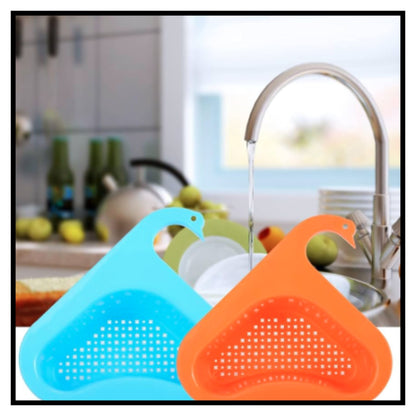 Blue and orange swan shaped triangle drain basket strainer in kitchen sink with water flowing