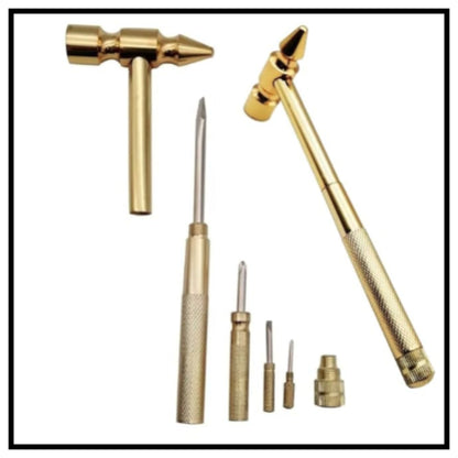 Gold colour multi-functional small metal hammer with hidden screwdriver bits set displayed on white background with black border
