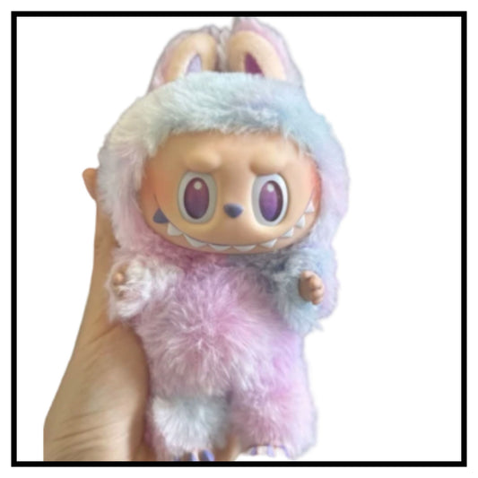 Labubu The Monsters Tasty Macarons Chestnut Cocoa vinyl plush toy in pastel fuzzy outfit with bunny ears held in hand