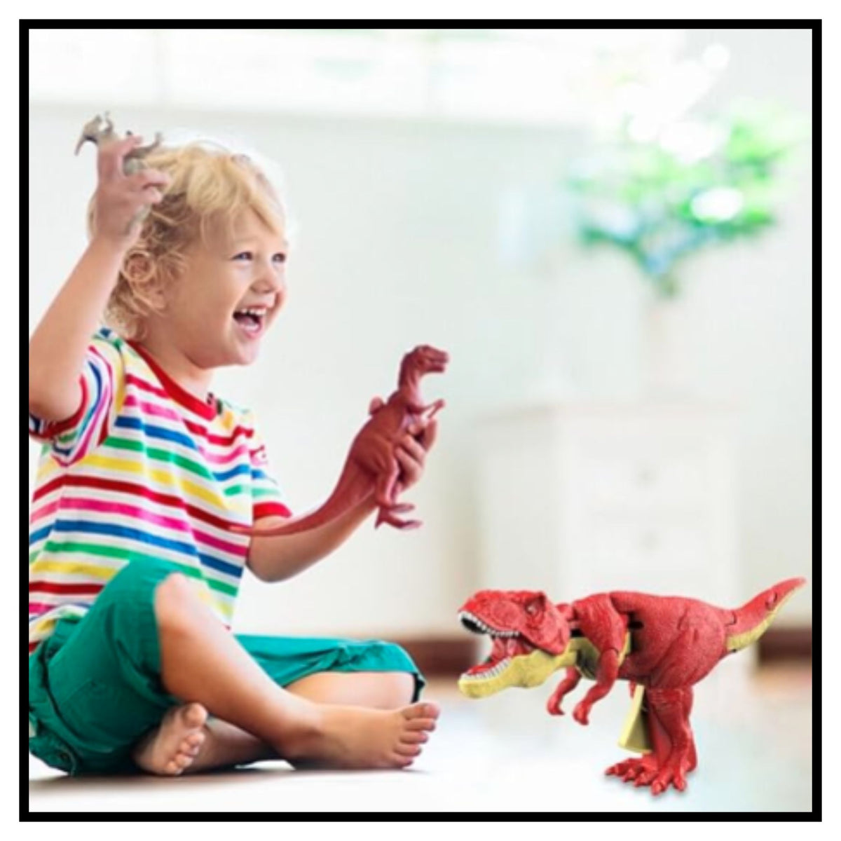 Happy child playing with red realistic dinosaur toys on floor, showing prehistoric adventure play for kids