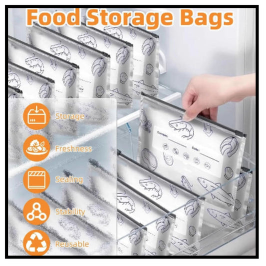 Food storage bags with fish print inside refrigerator drawer hand placing bag reusable foil zip lock
