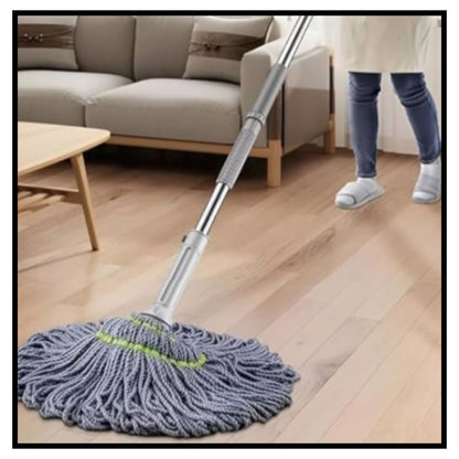 Person mopping light wood floor in living room using long-handled stainless steel twist mop with gray microfiber head