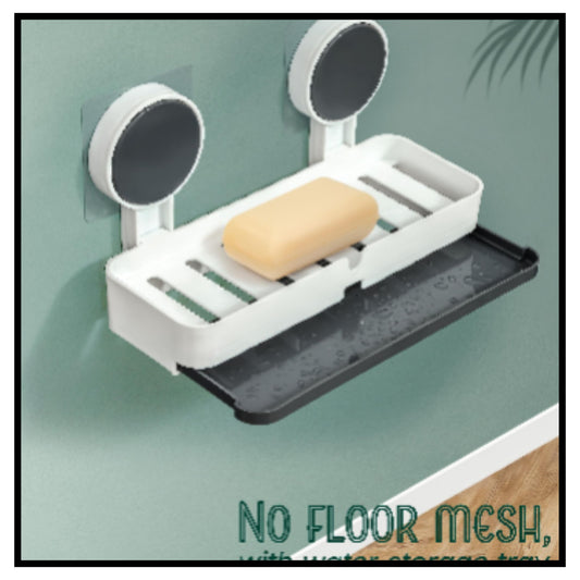 White wall mounted double suction soap dish holder with drain tray holding a bar of soap on blue background